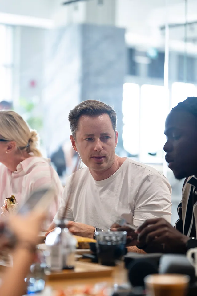 Guests gathered around a table