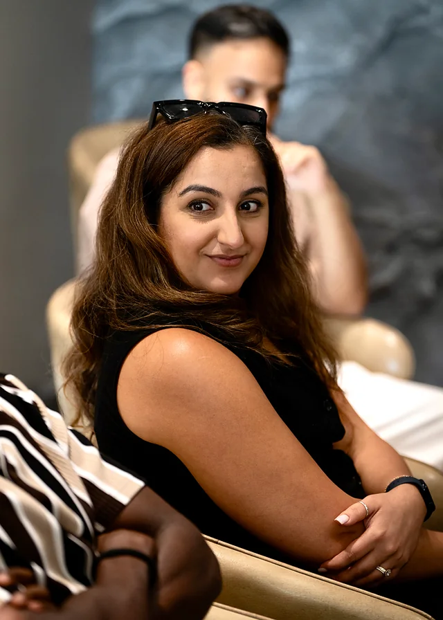 A guest turning towards the conversation
