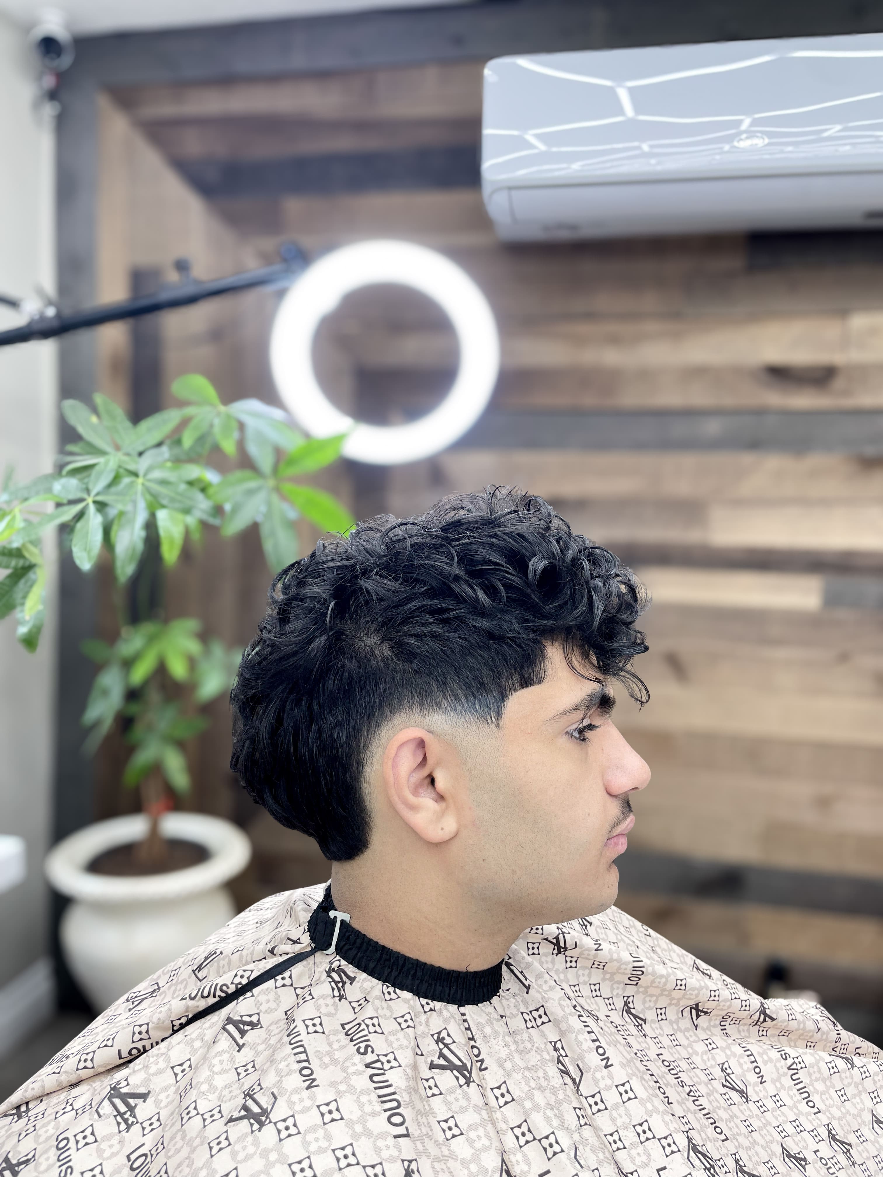 Sharp fade at Alexa's Barbershop