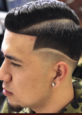 Barber at work Jay's Barber House Norco