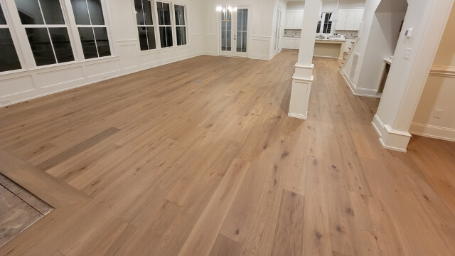 Hardwood floor installation in a bright Raleigh NC home by Atlas Flooring & Design