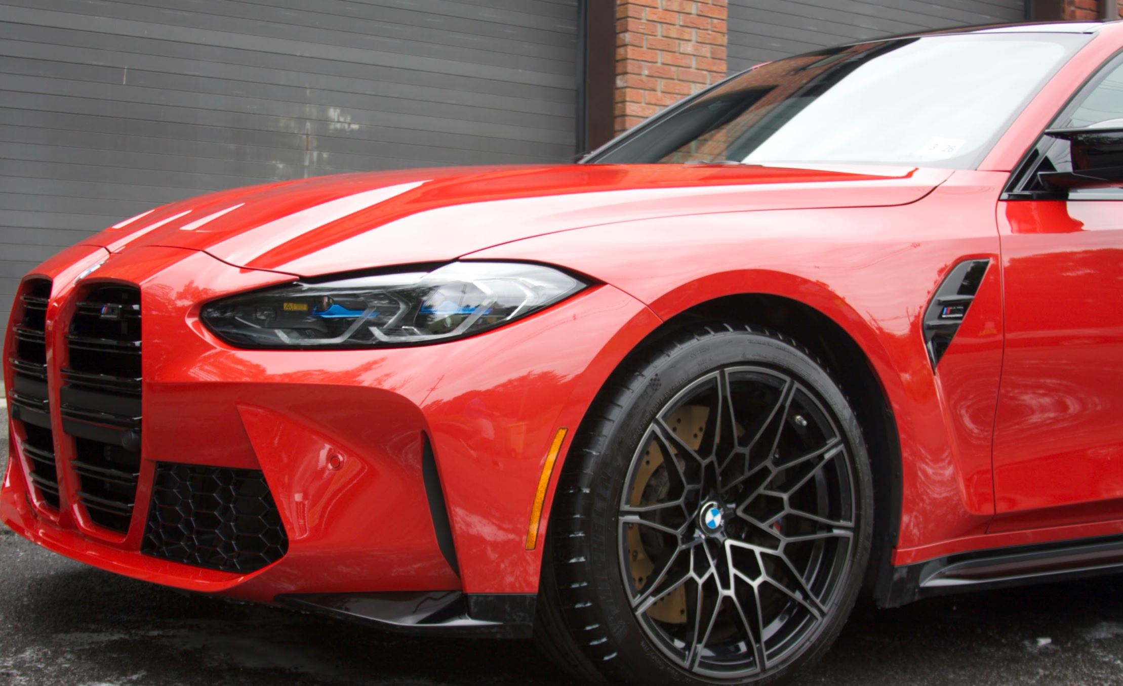 Toronto red BMW M4 with full front paint protection film