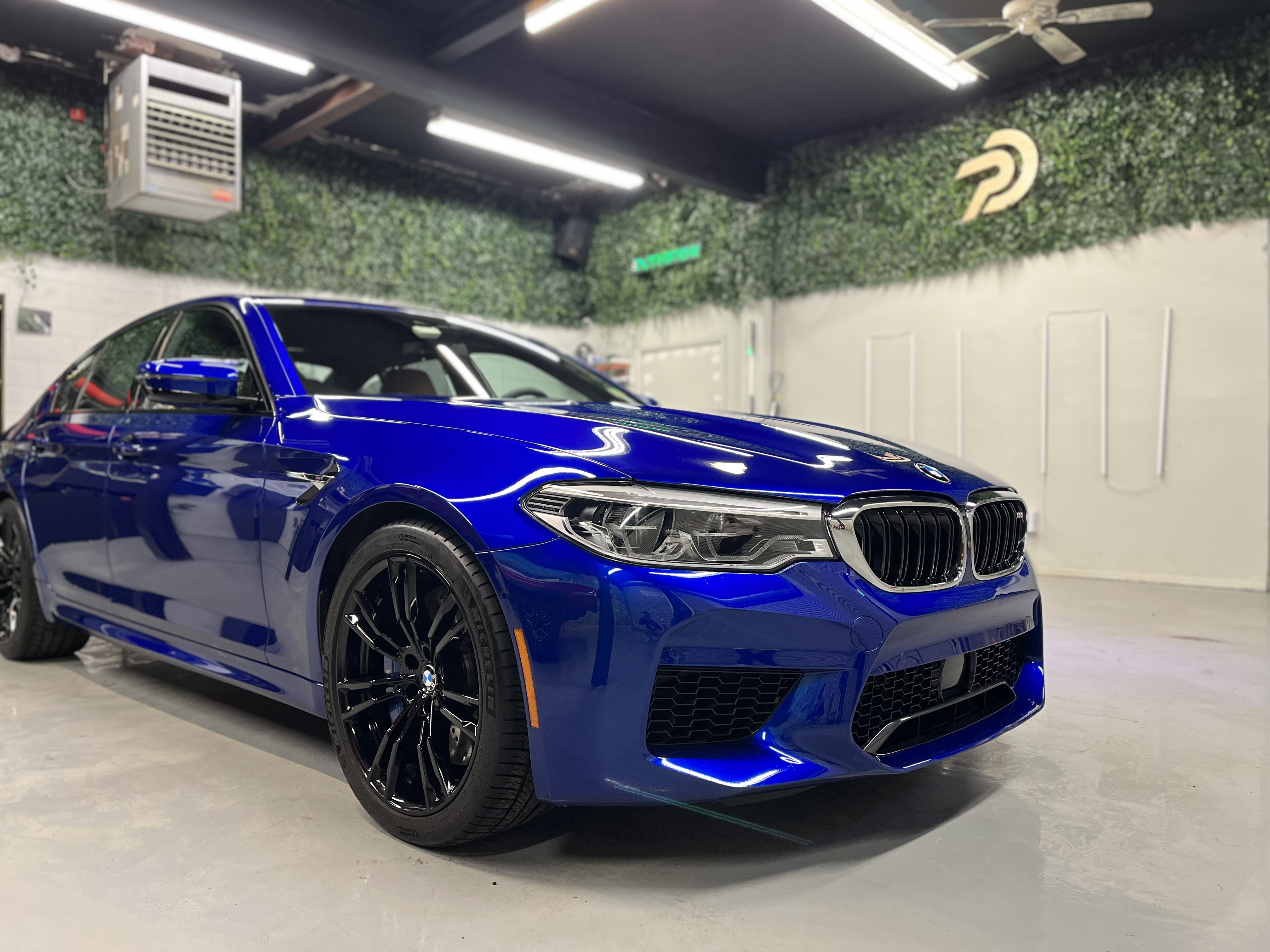 Marina Bay blue BMW M5 after ceramic coating