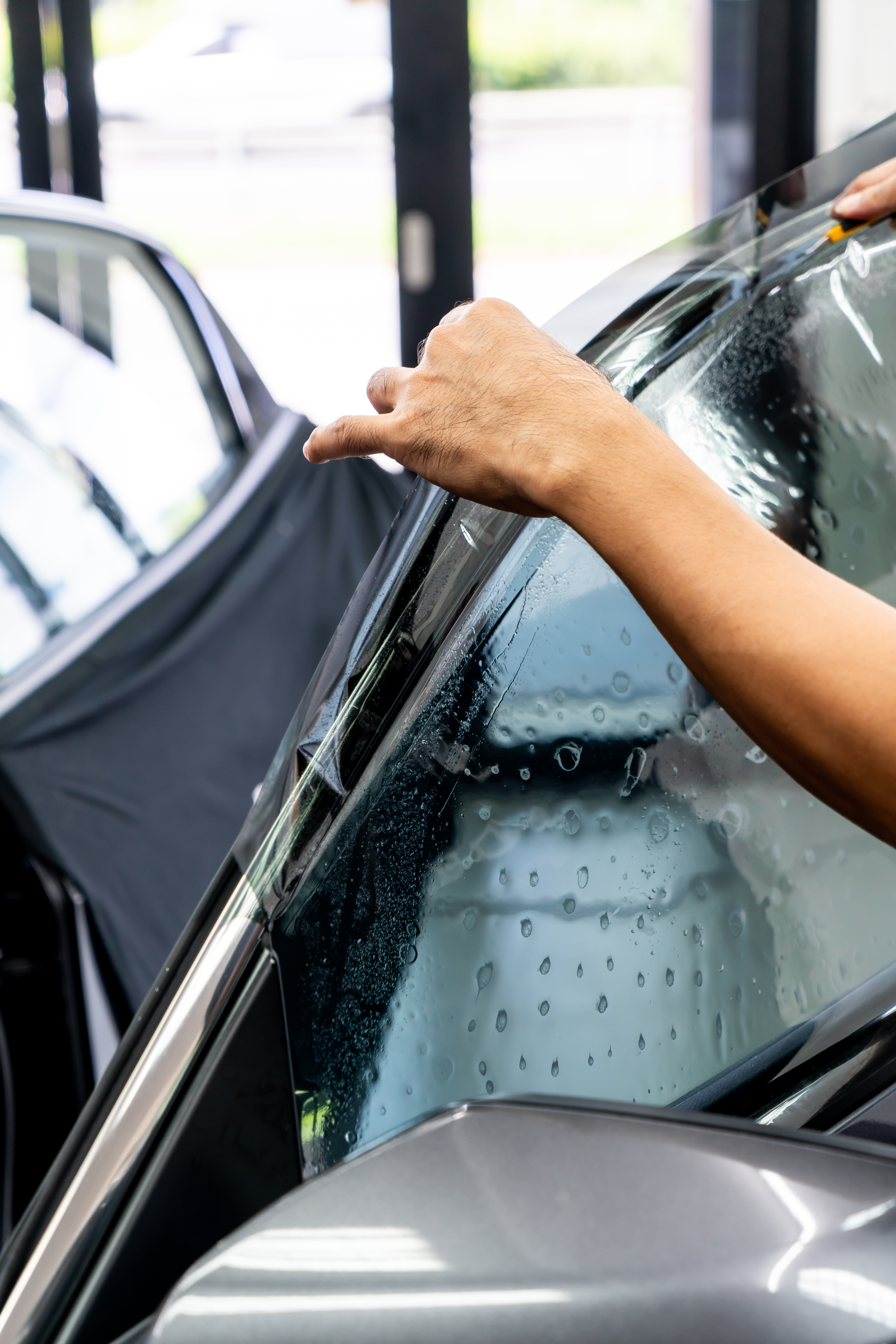 Ceramic window tint being applied