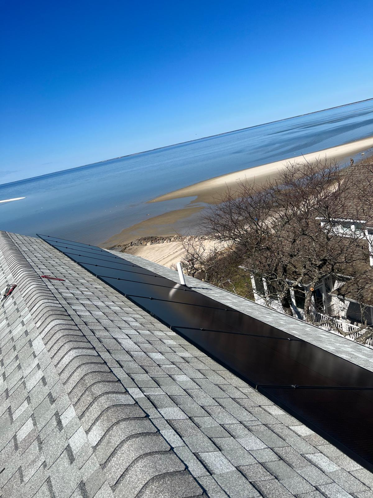 Oceanfront solar panel installation on a South Shore Massachusetts home
