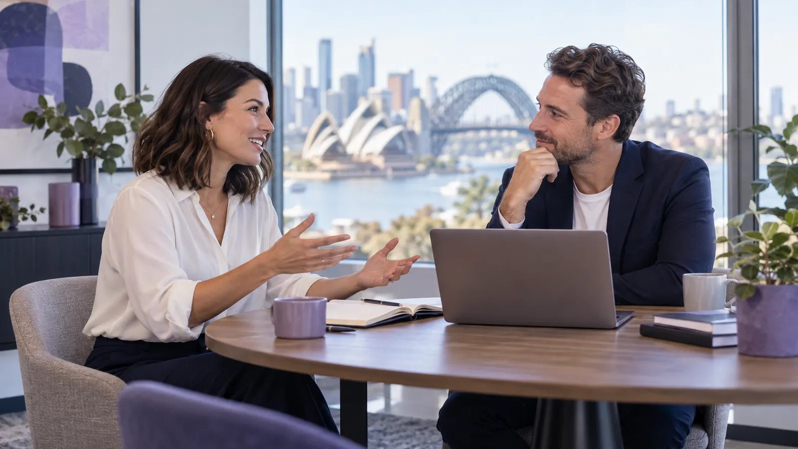 Business owner discussing growth goals with a digital strategy advisor in Sydney