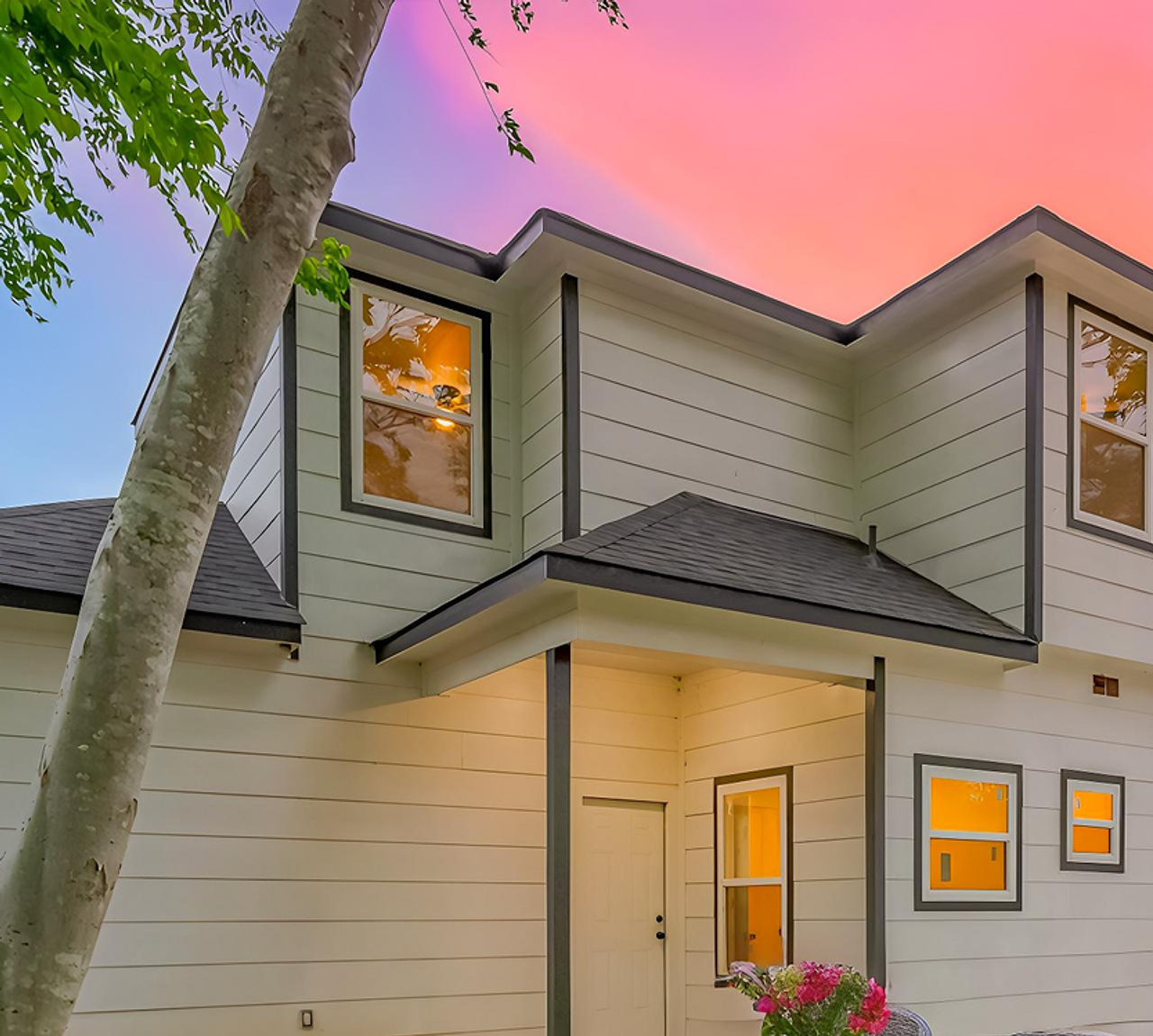 Two-story Alpha Team home at dusk