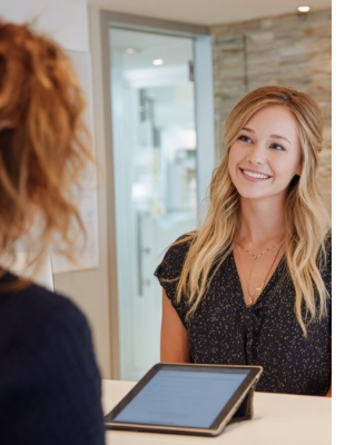 Patient at One8Clinic reception in Melrose Arch before a personalised micro-needling consultation for uneven skin tone Patient at One8Clinic reception in Melrose Arch before a personalised micro-needling consultation for uneven skin tone