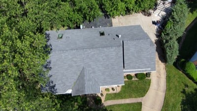 Completed asphalt shingle roof installation for a residential property. 