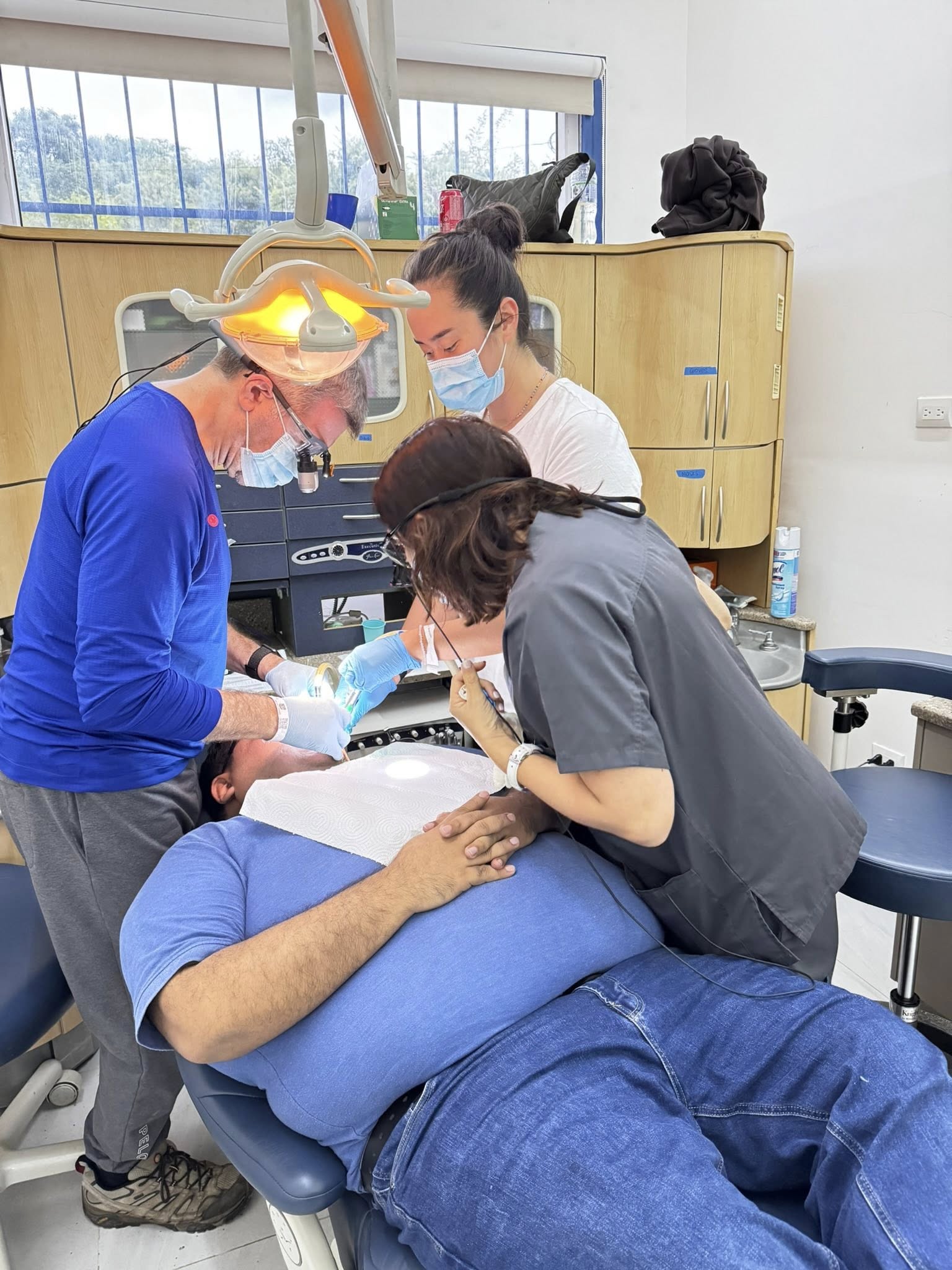 Dr. Long performing dental implant procedure
