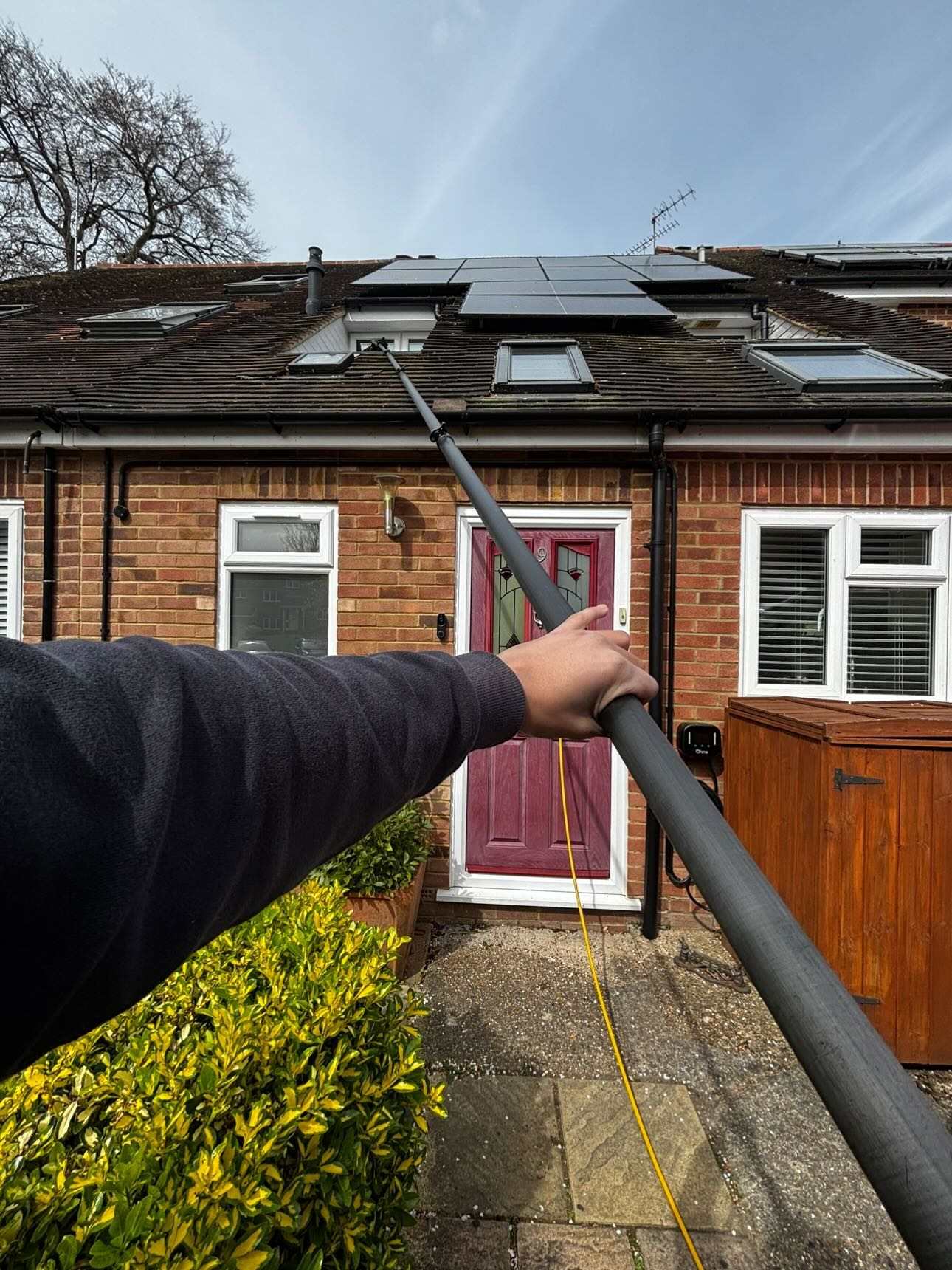 First person view cleaning a roof window