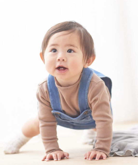 baby 'spider man' crawling