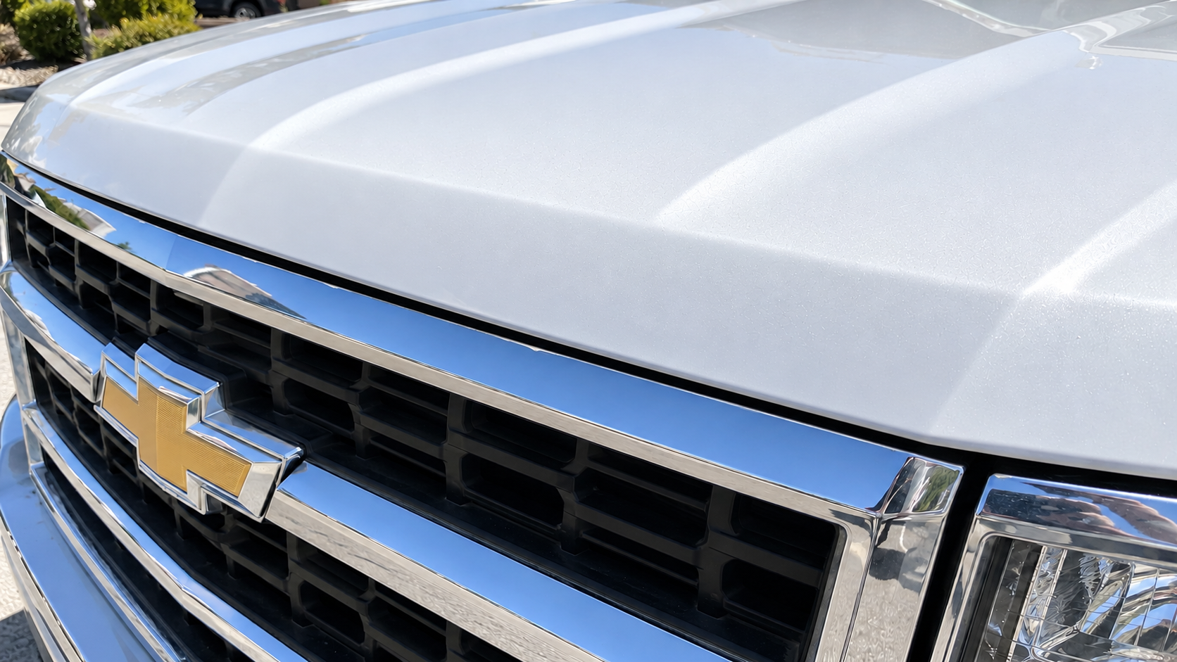 After: the same hood edge with seamless Liquid PPF and no film line
