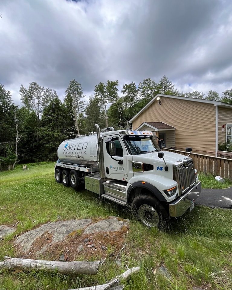 United Sewer & Septic pump truck on site