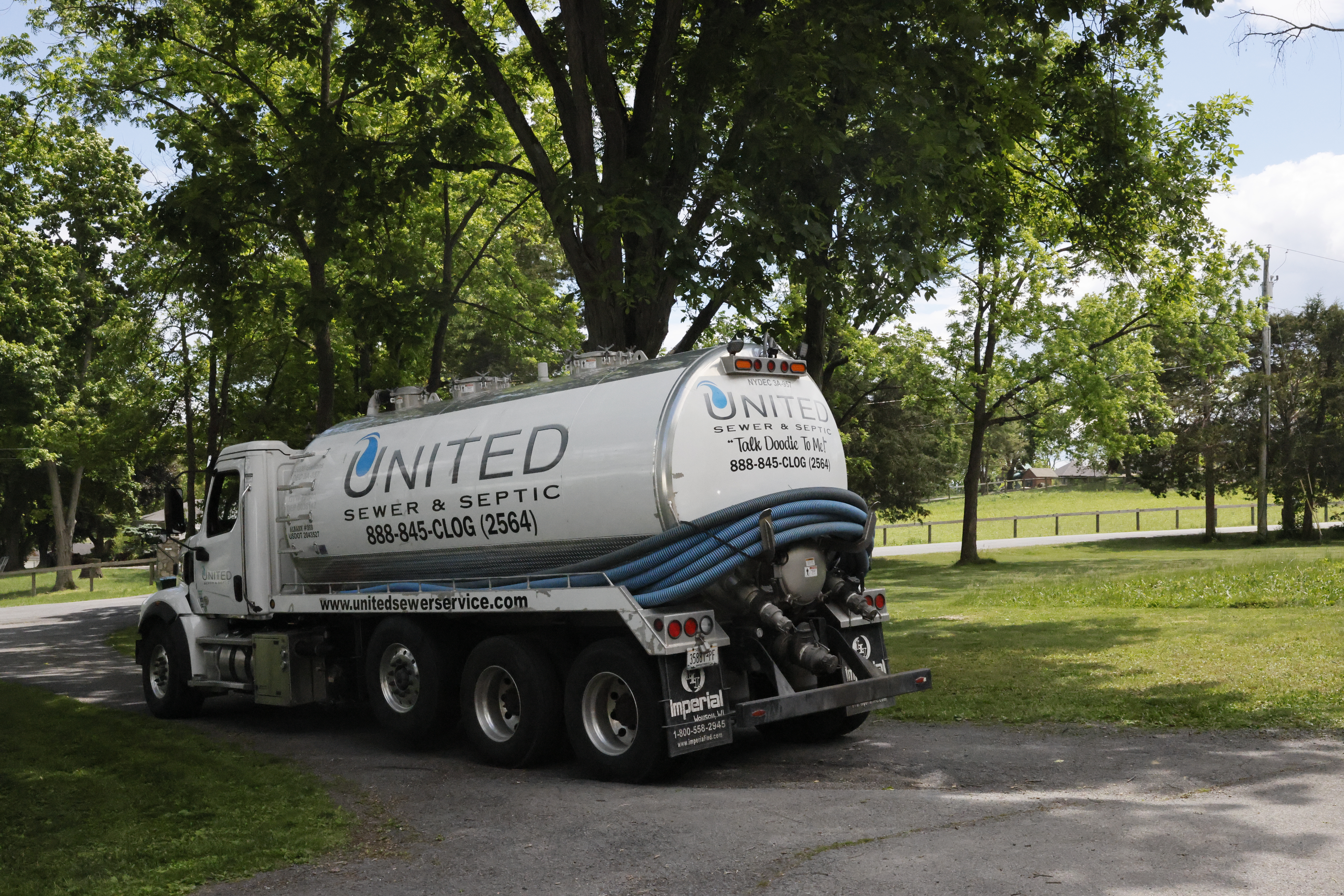 United Sewer and Septic service truck on site