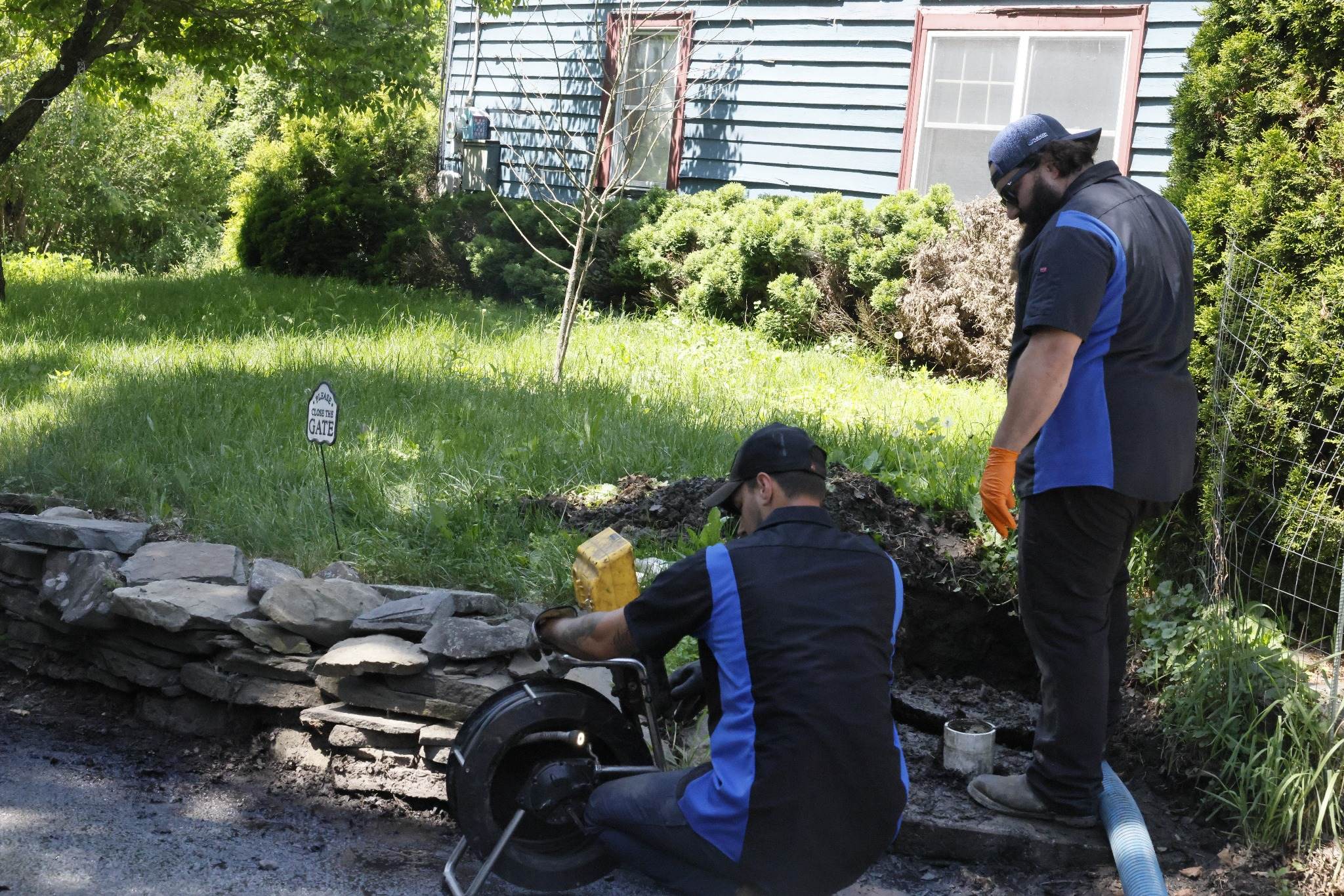 United Sewer and Septic technicians running a sewer camera inspection
