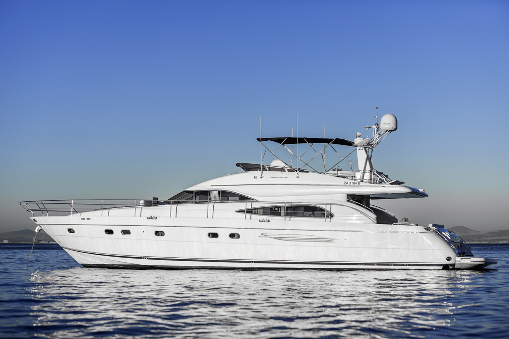 Private luxury motor yacht charter on calm Cape waters