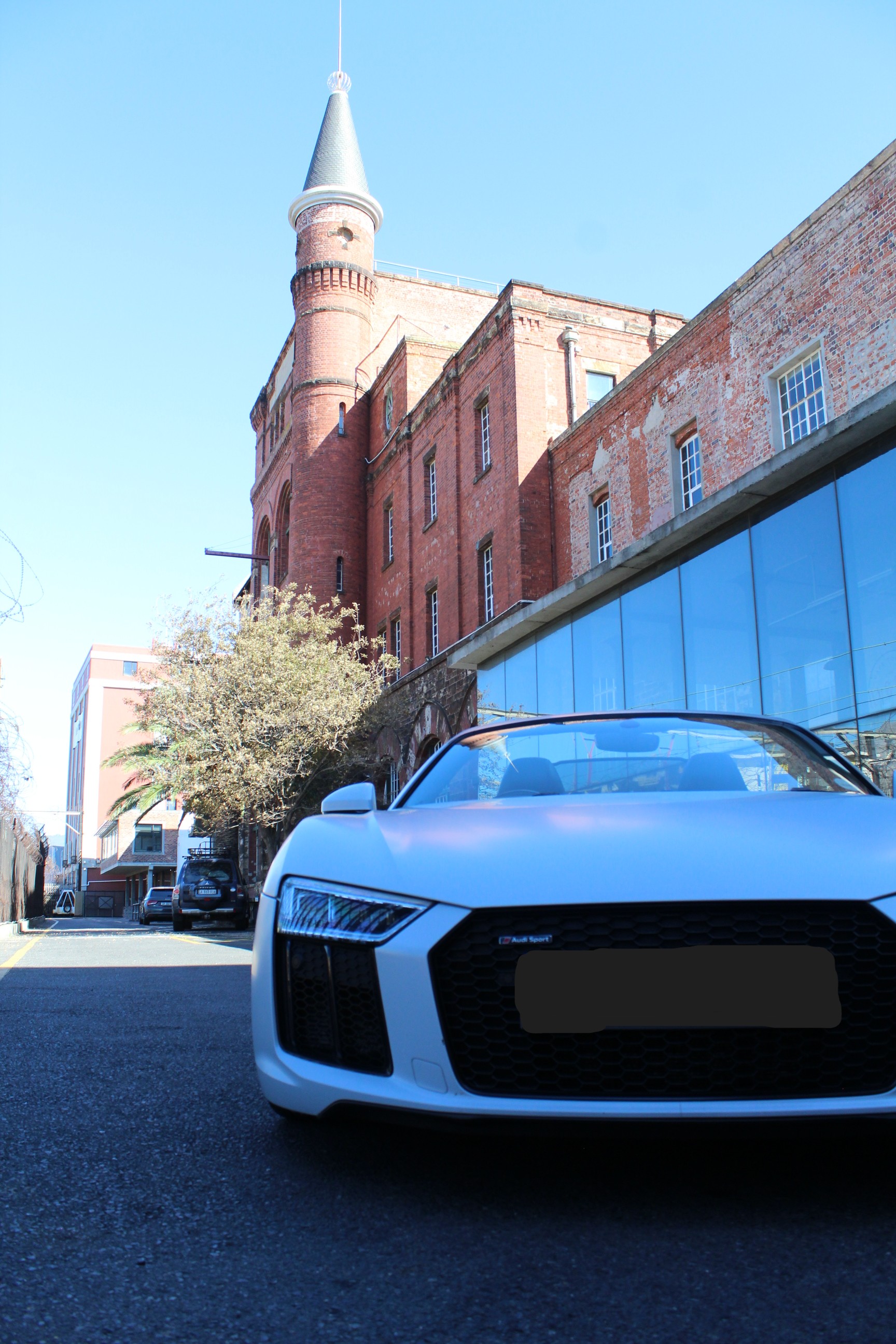 White 2019 Audi R8 Spyder V10 Convertible for hire in Cape Town.