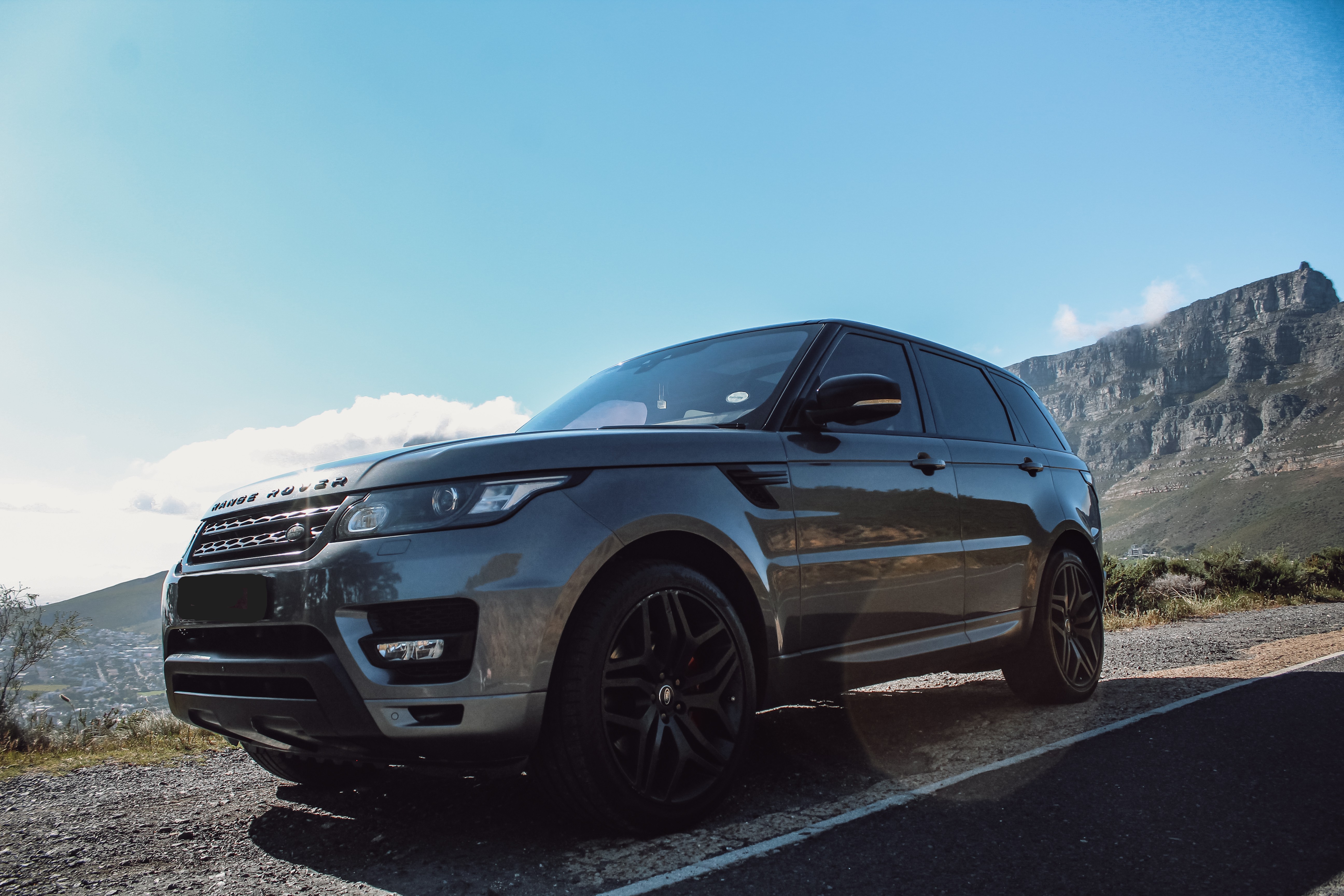 2018 Range Rover Sport V8 Supercharged in gun metal black for hire in Cape Town.