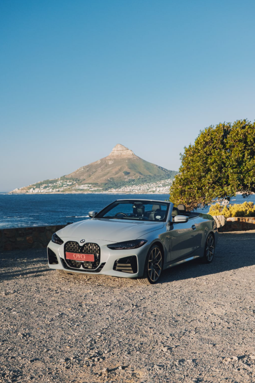 White 2024 BMW M440i xDrive Convertible for hire in Cape Town.
