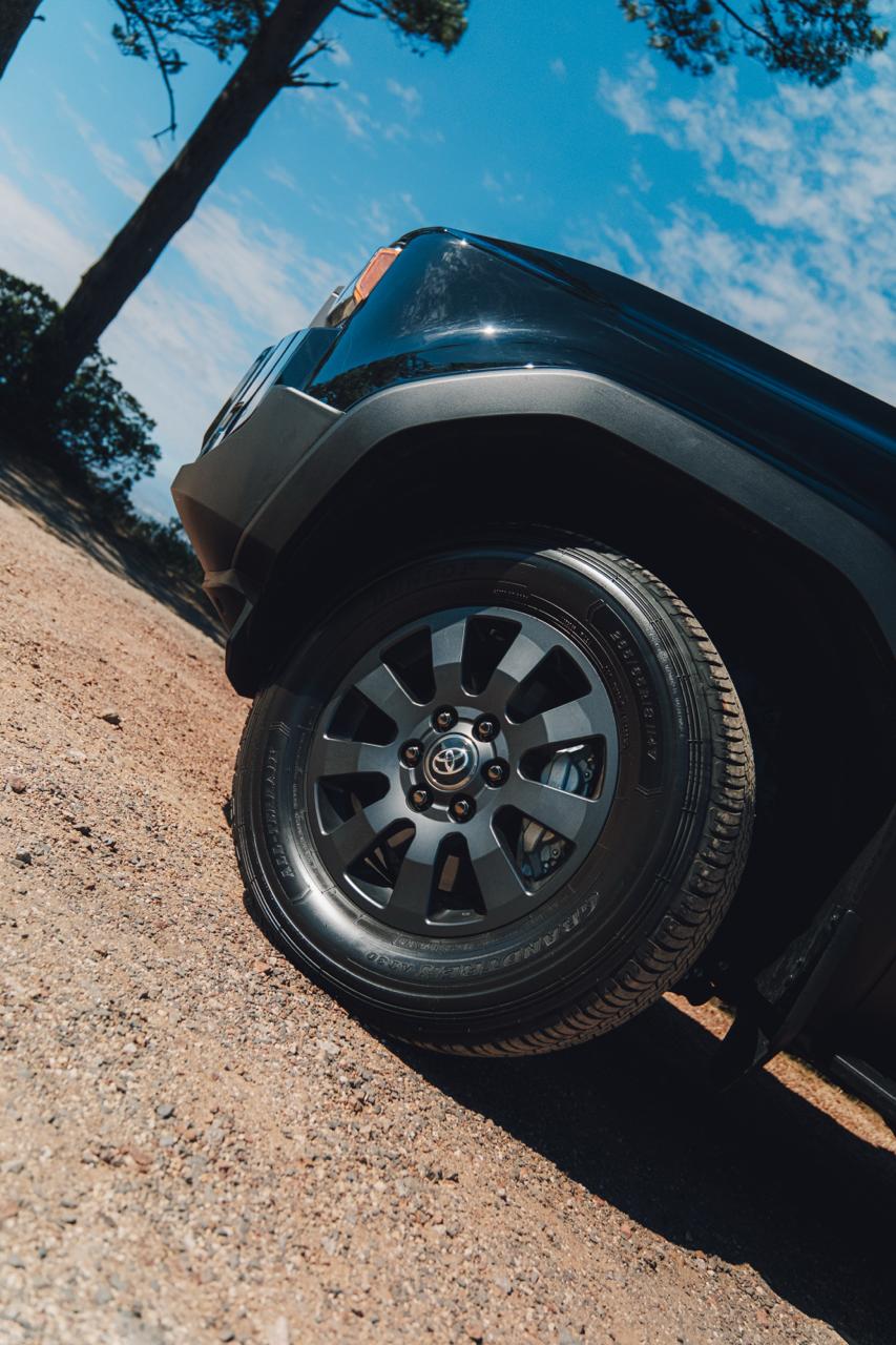 Black 2025 Toyota Land Cruiser Prado VXR side view for hire in Cape Town.