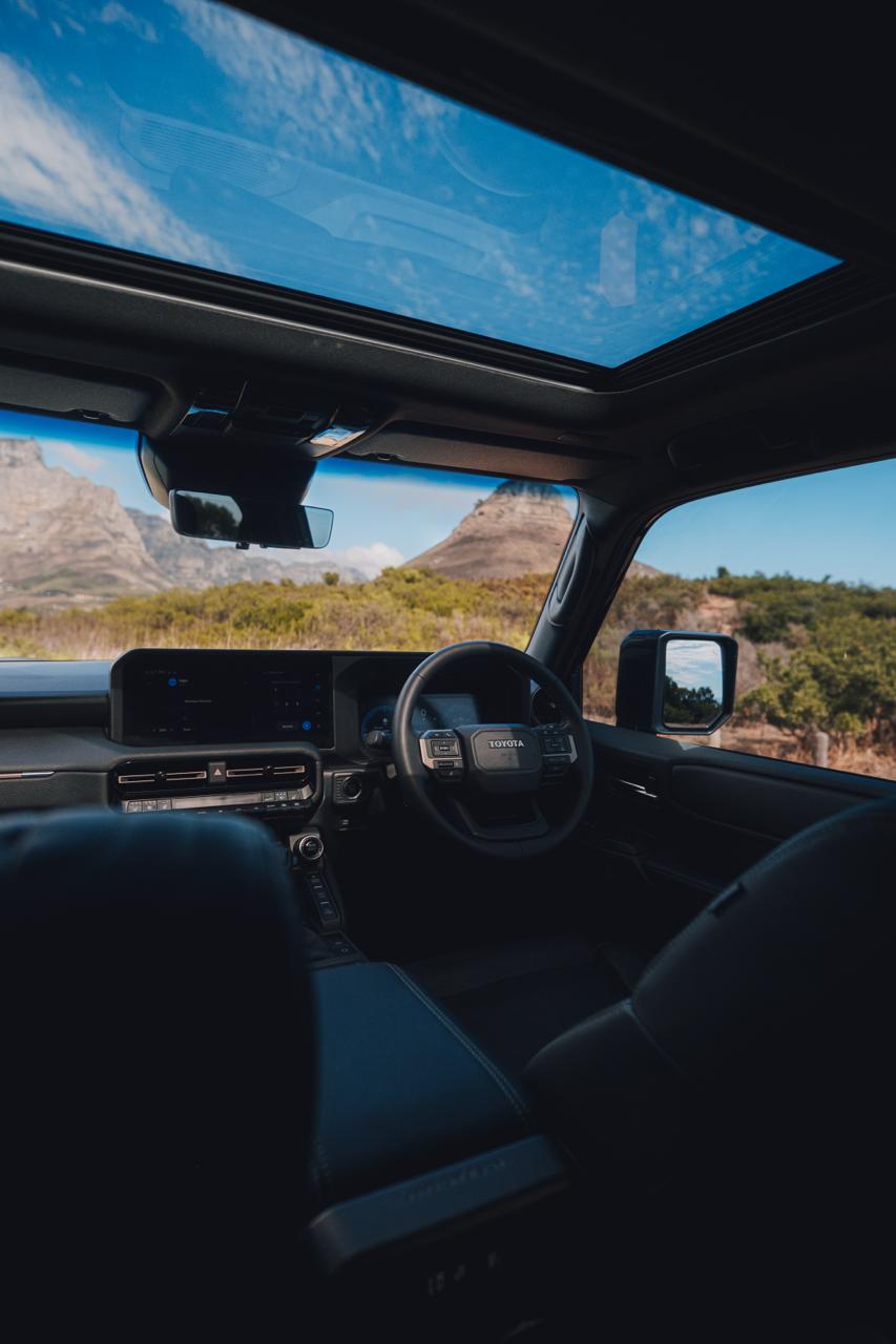 Black 2025 Toyota Land Cruiser Prado VXR front side view for hire in Cape Town.
