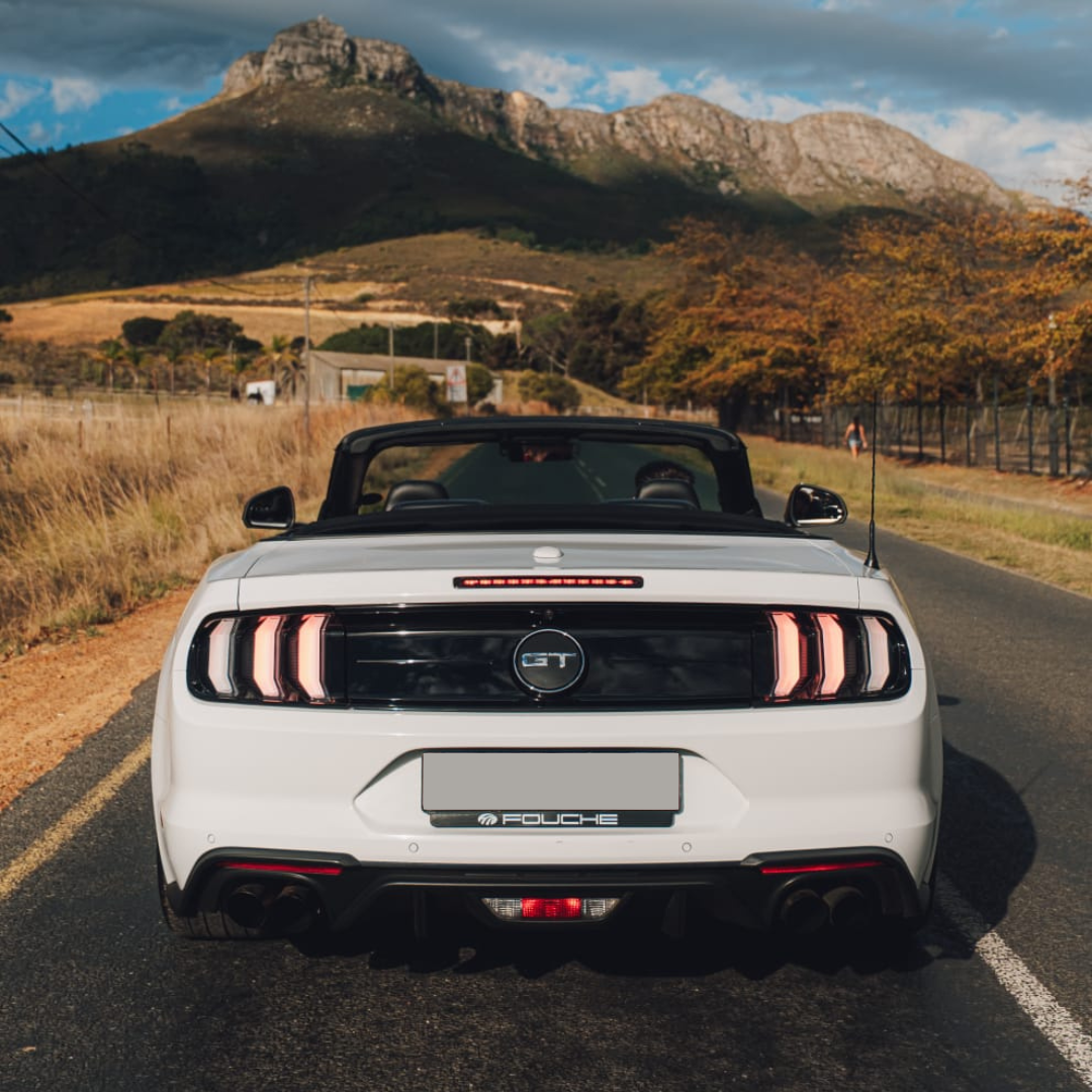 White 2021 Ford Mustang GT side angle view for hire in Cape Town.