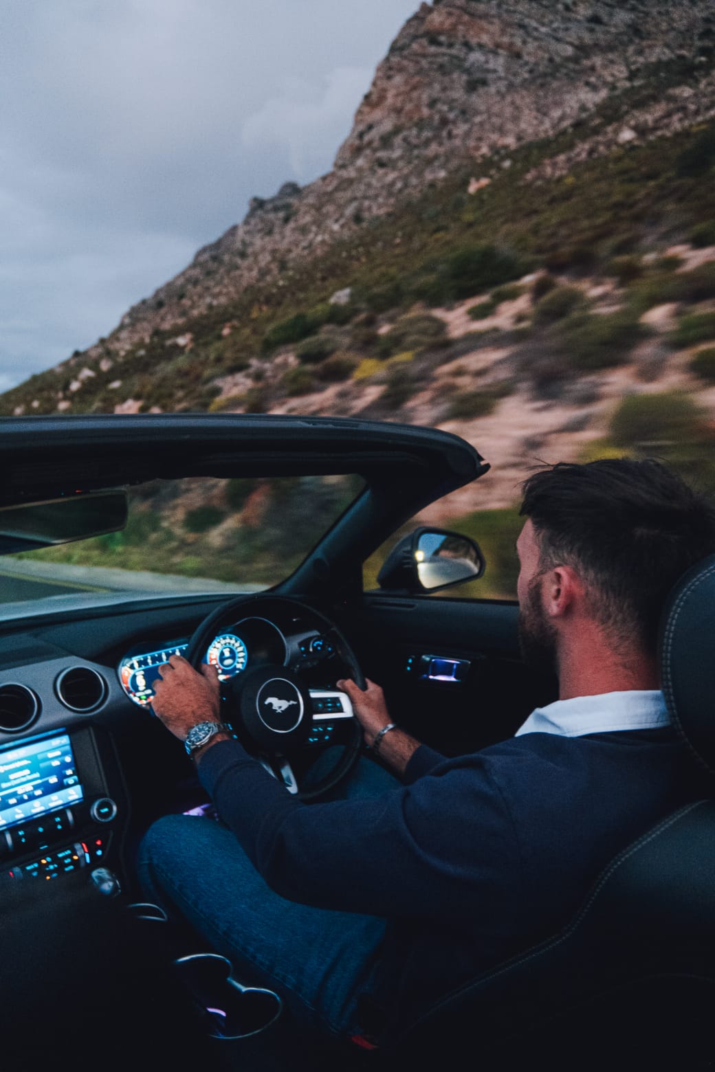 White 2021 Ford Mustang GT parked outdoor angle for hire in Cape Town.