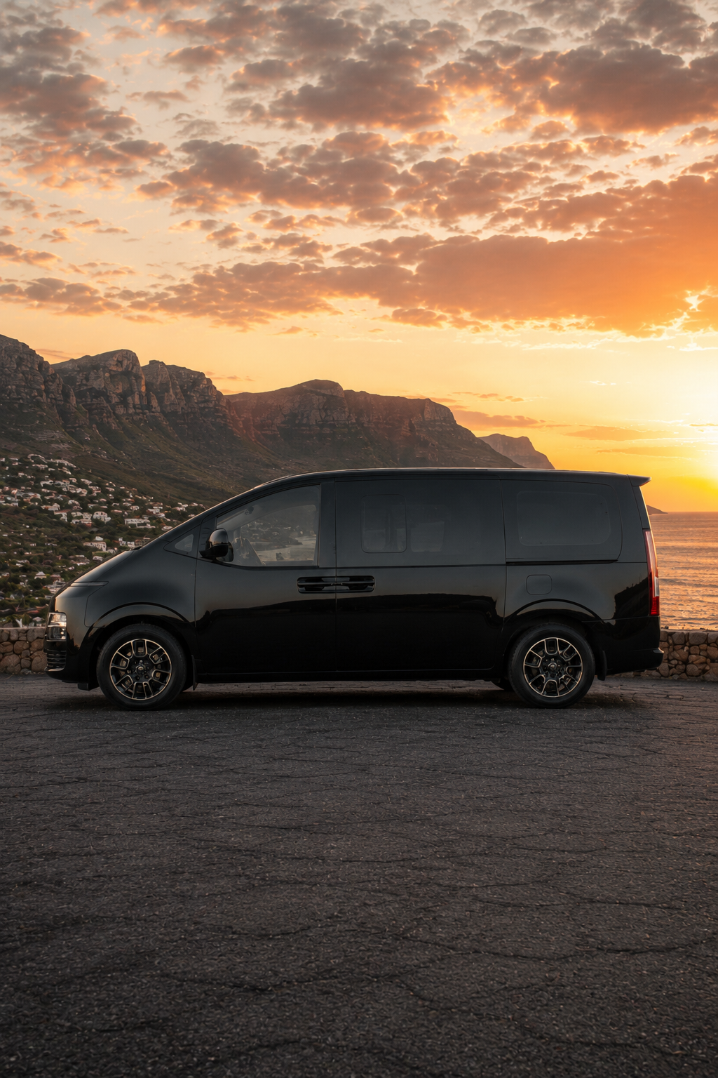 Side profile of the black 2026 Hyundai Staria