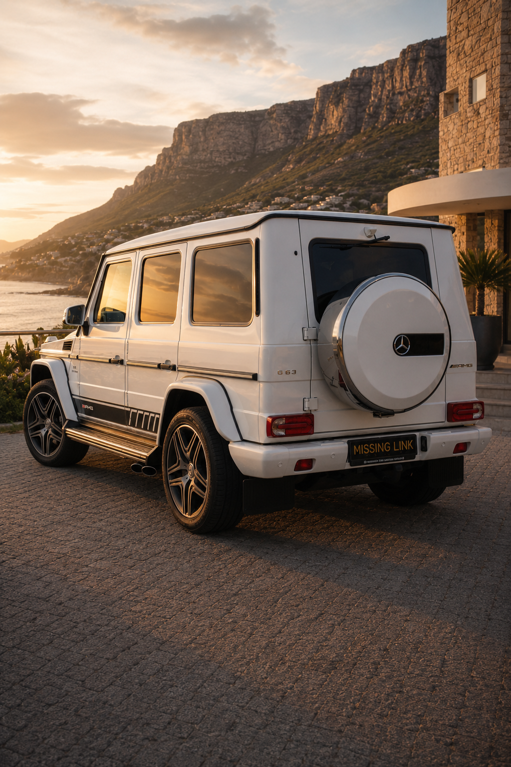 Rear three-quarter view of the white 2017 Mercedes Benz G63 AMG V8 BiTurbo