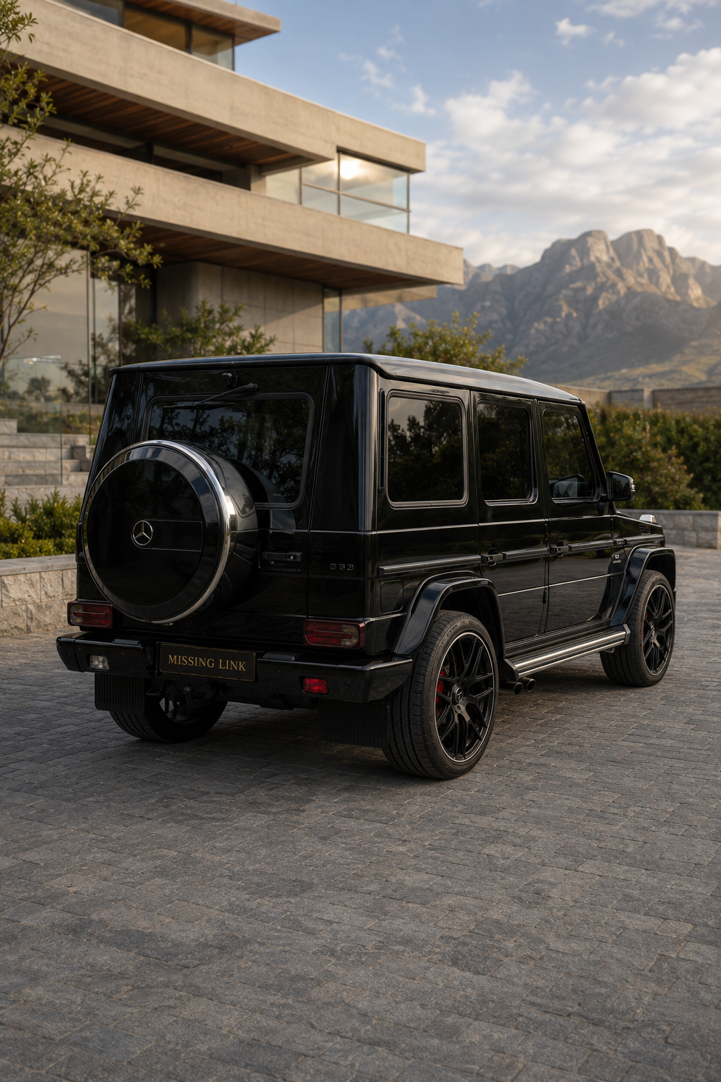 Rear three-quarter view of the black 2025 Mercedes G63 V8 BiTurbo