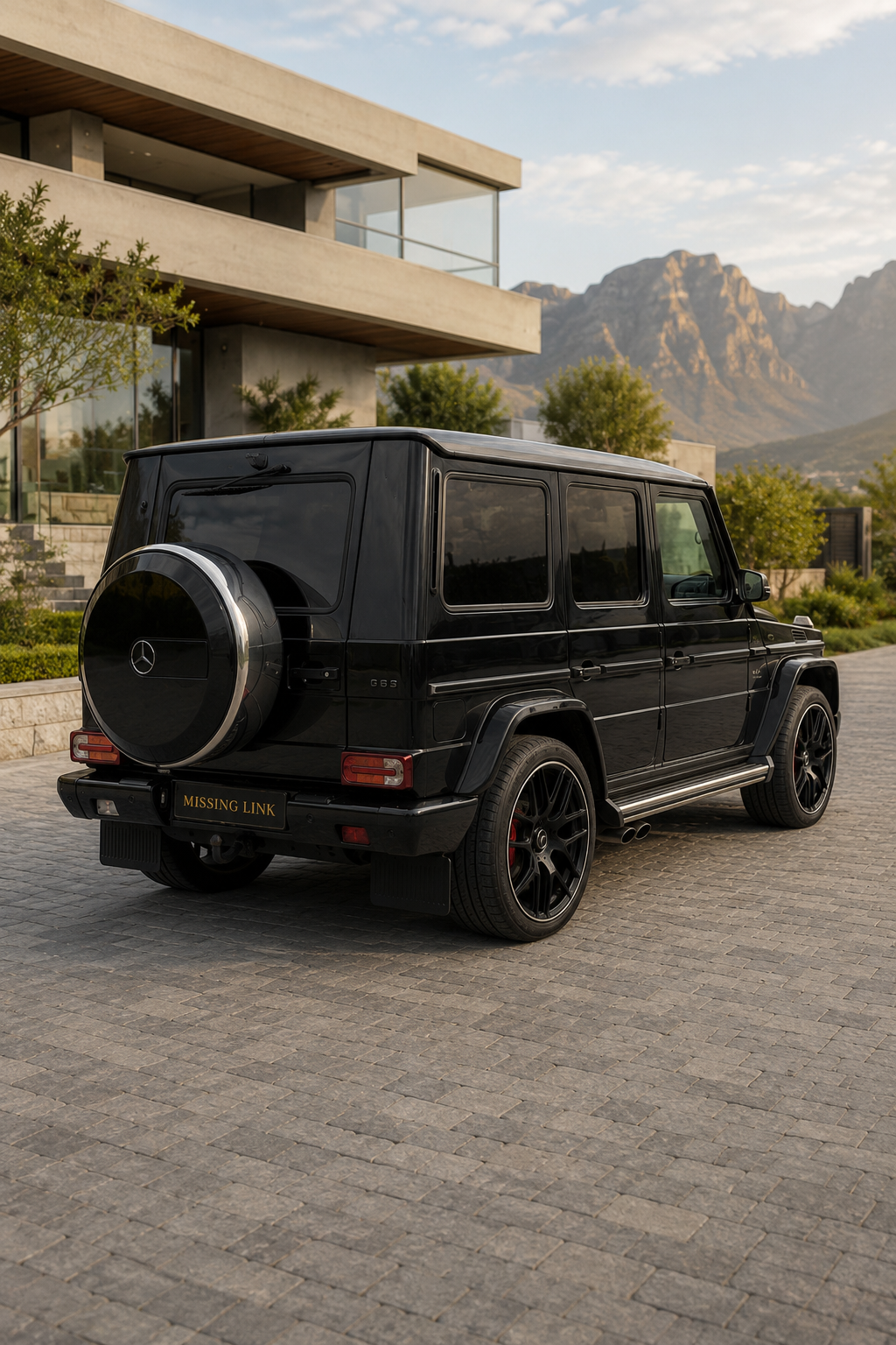 Rear side angle view of the black 2025 Mercedes G63 V8 BiTurbo