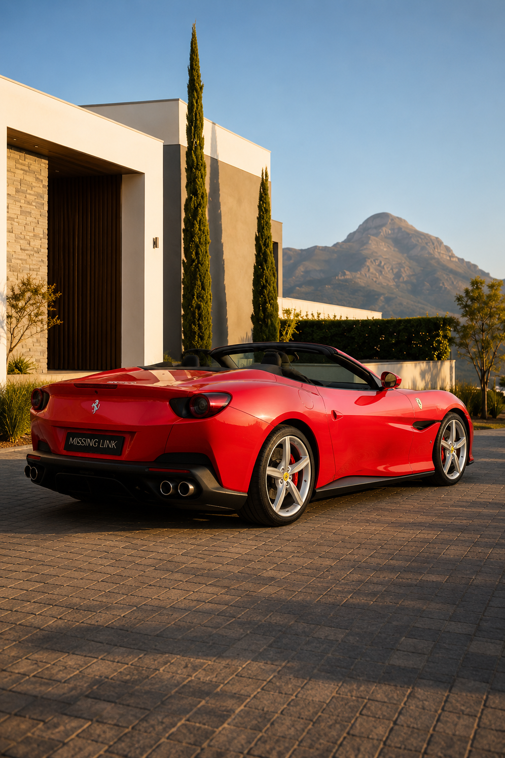 Rear three-quarter view of the red 2024 Ferrari Portofino