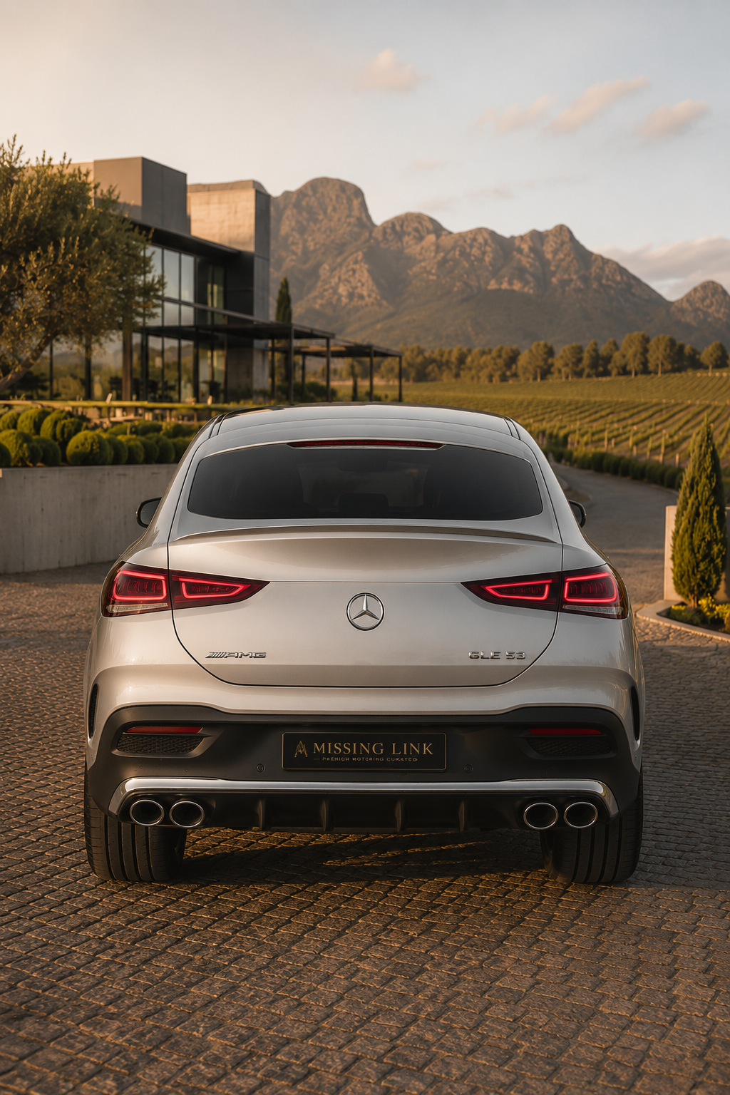 Rear view of the silver 2021 Mercedes Benz GLE 53