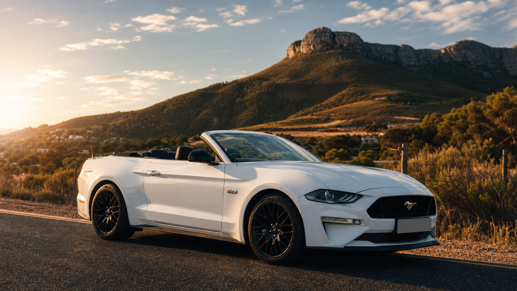 Side view of the white Ford Mustang GT convertible