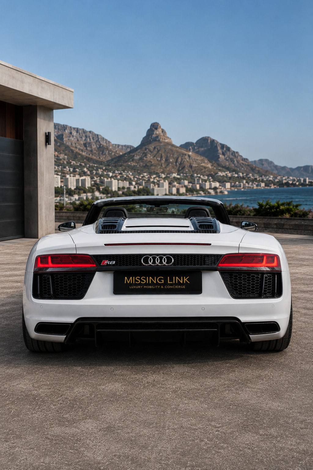 Rear view of the white 2019 Audi R8 Spyder V10 Convertible