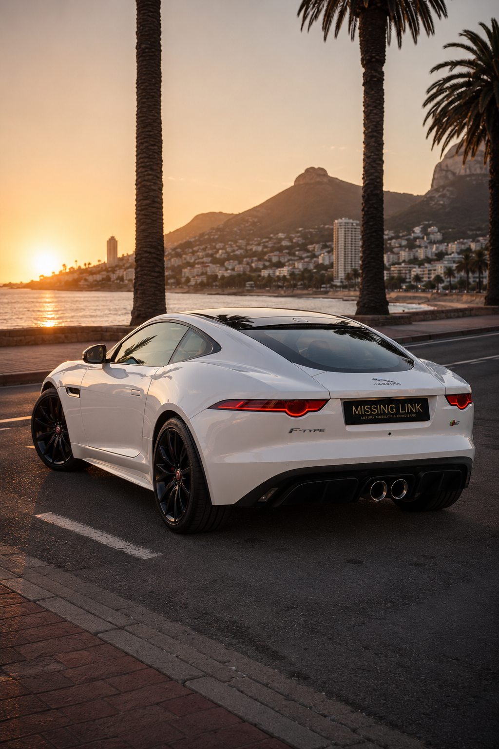 Rear three-quarter view of the white 2017 Jaguar F-Type V6 Hardtop