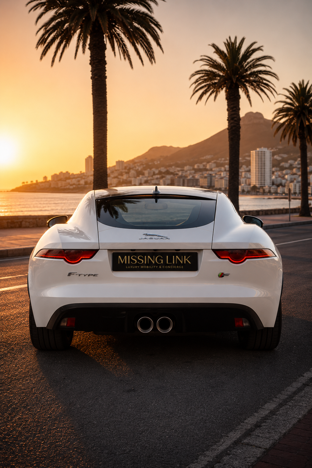 Rear view of the white 2017 Jaguar F-Type V6 Hardtop