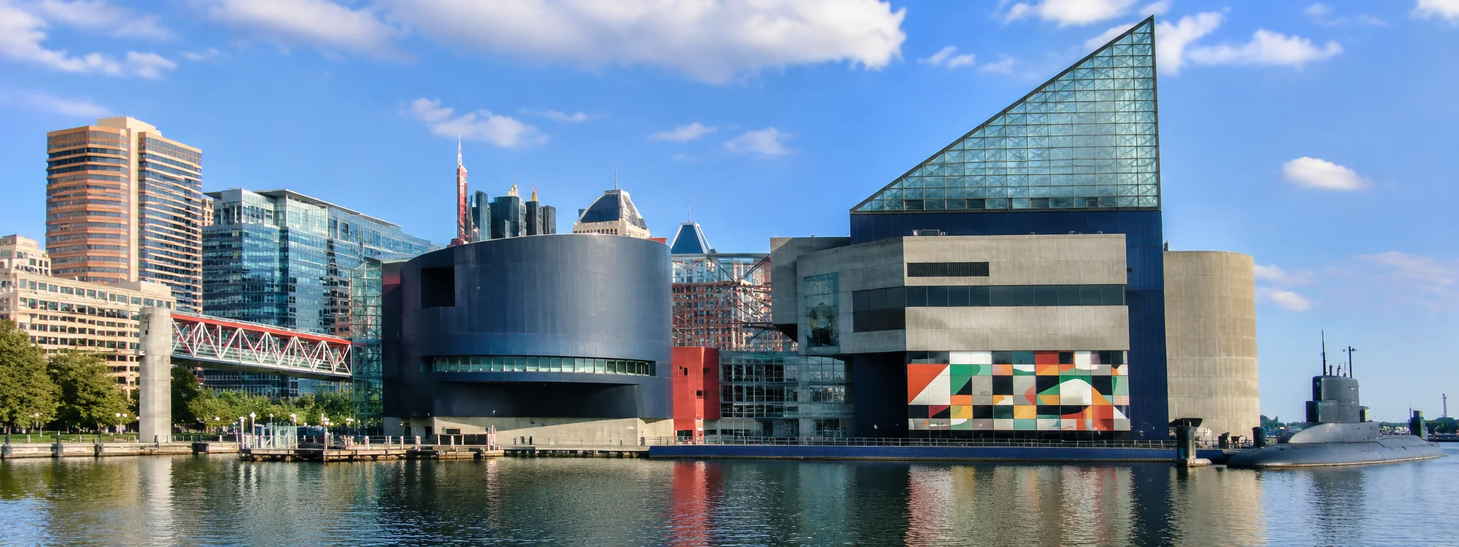 Baltimore National Aquarium at Inner Harbor with waterfront skyline in Baltimore, Maryland