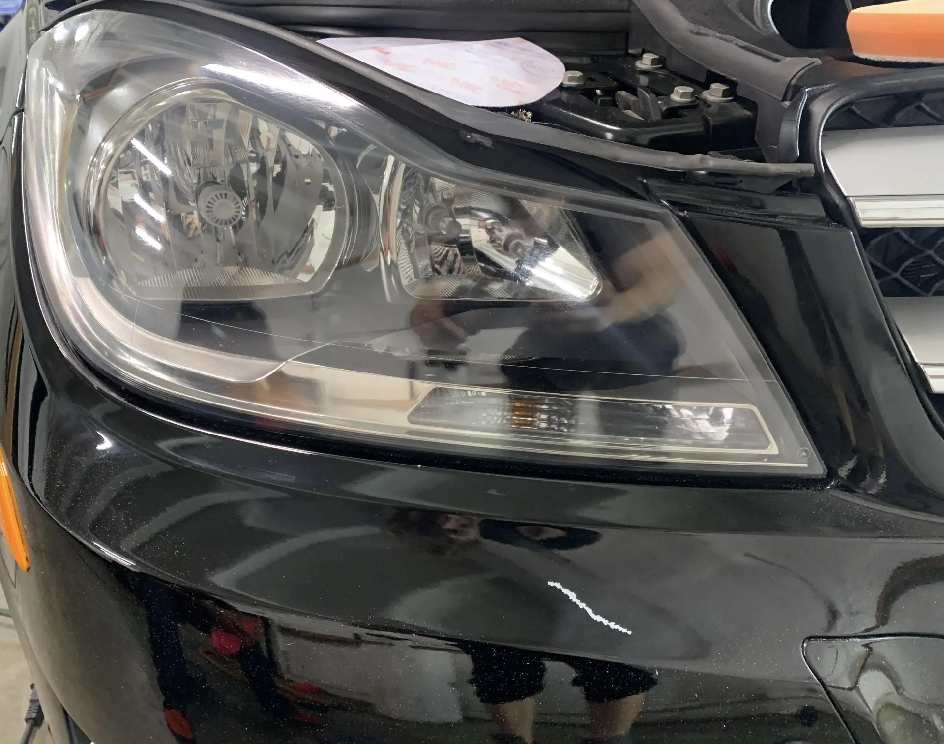 Cloudy automotive headlight before restoration