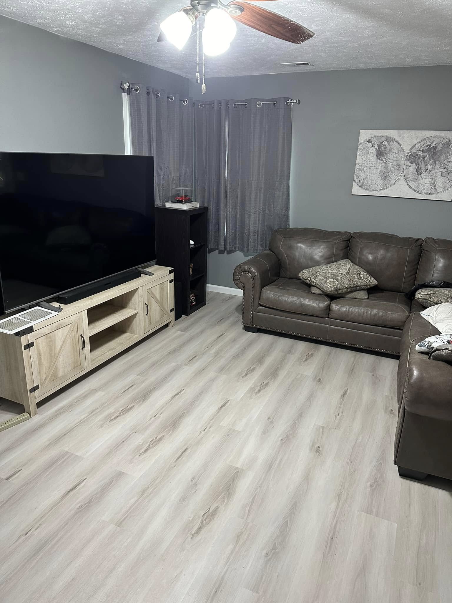 Light luxury vinyl plank flooring in a living room in Bloomington, Illinois