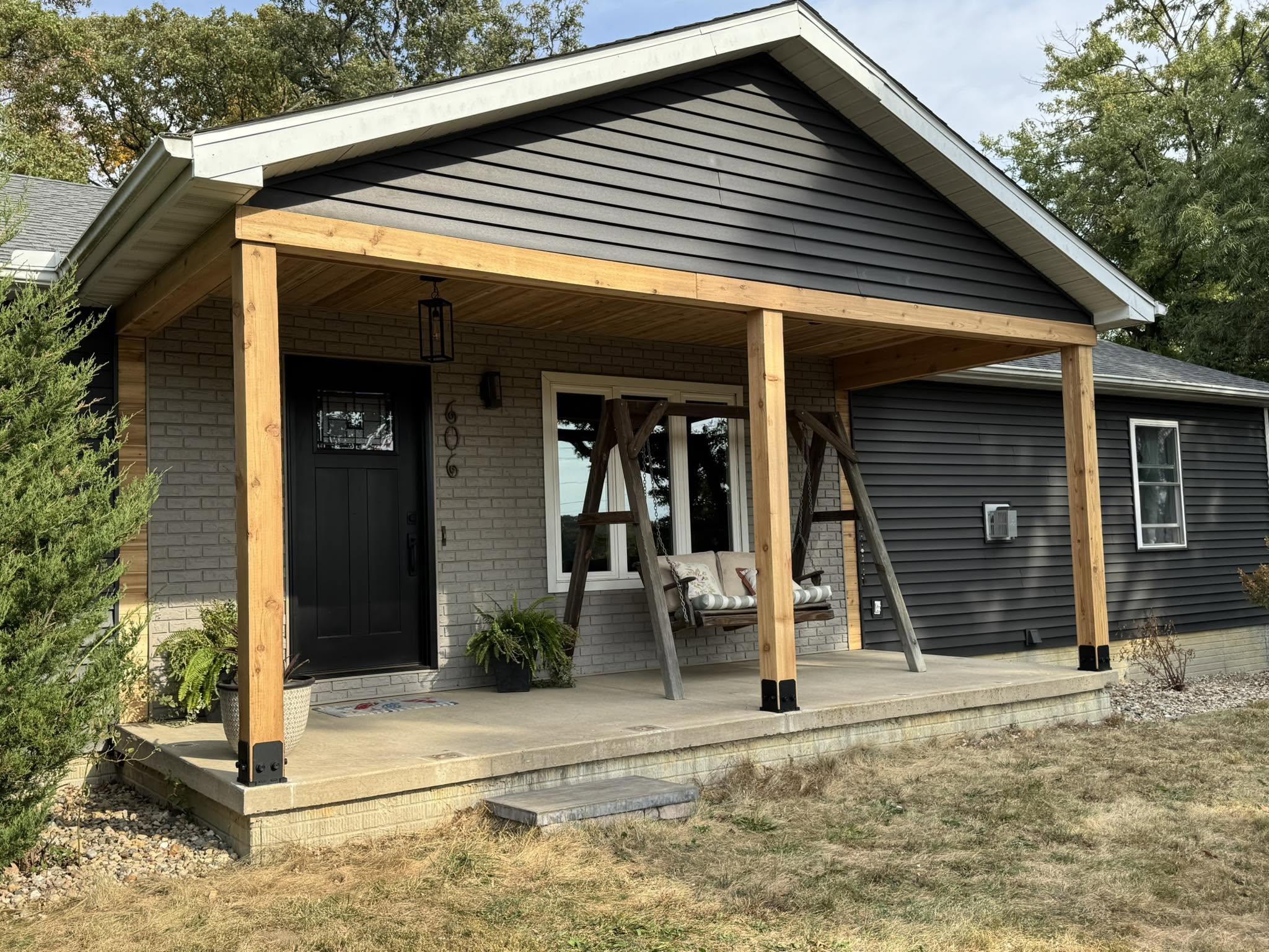 Custom cedar covered front porch in Bloomington, Illinois