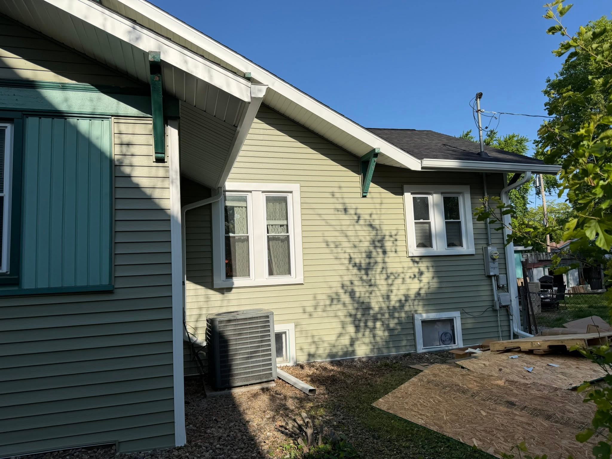 Vinyl siding with a board and batten accent gable in Bloomington, Illinois