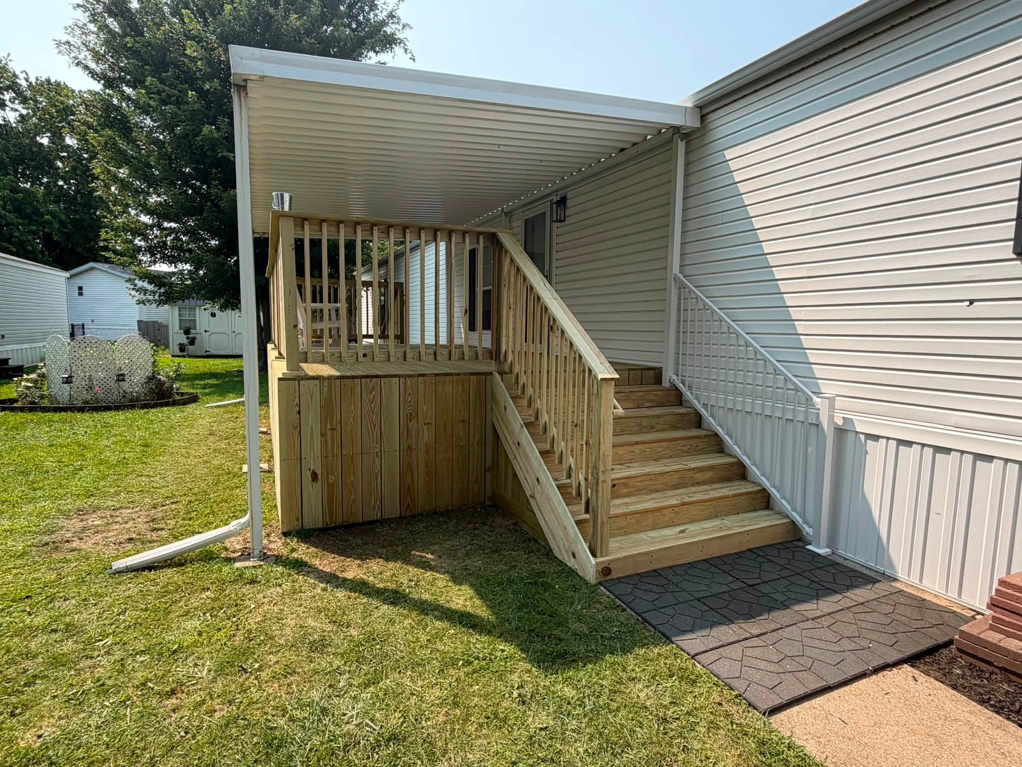 Covered deck and stairs on a mobile home in Bloomington, Illinois