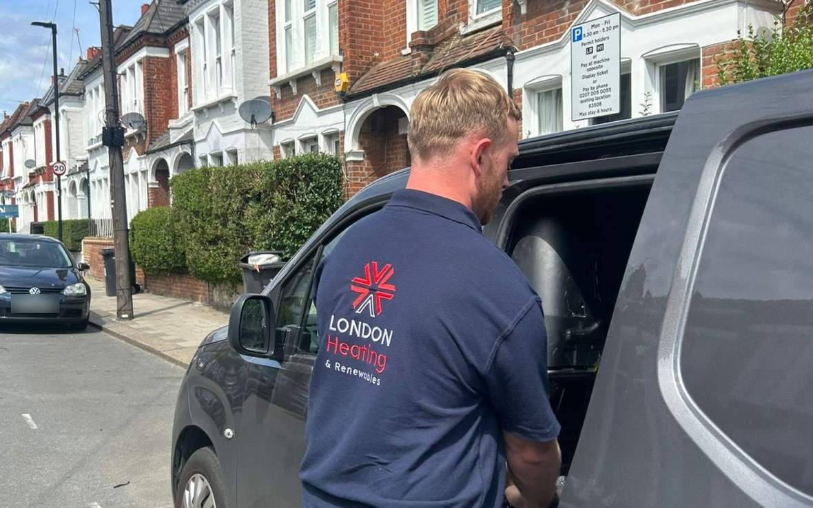 Ryan from London Heating & Renewables at the van on a London street