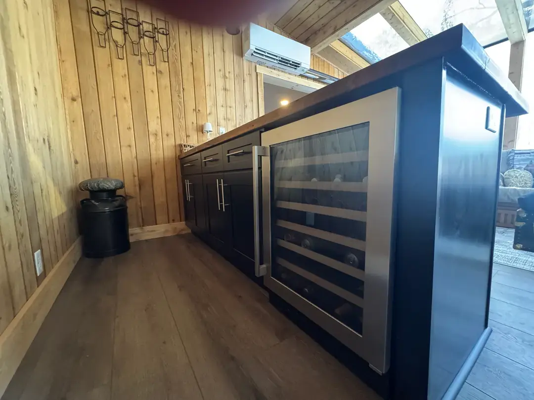 full bar with drink fridge