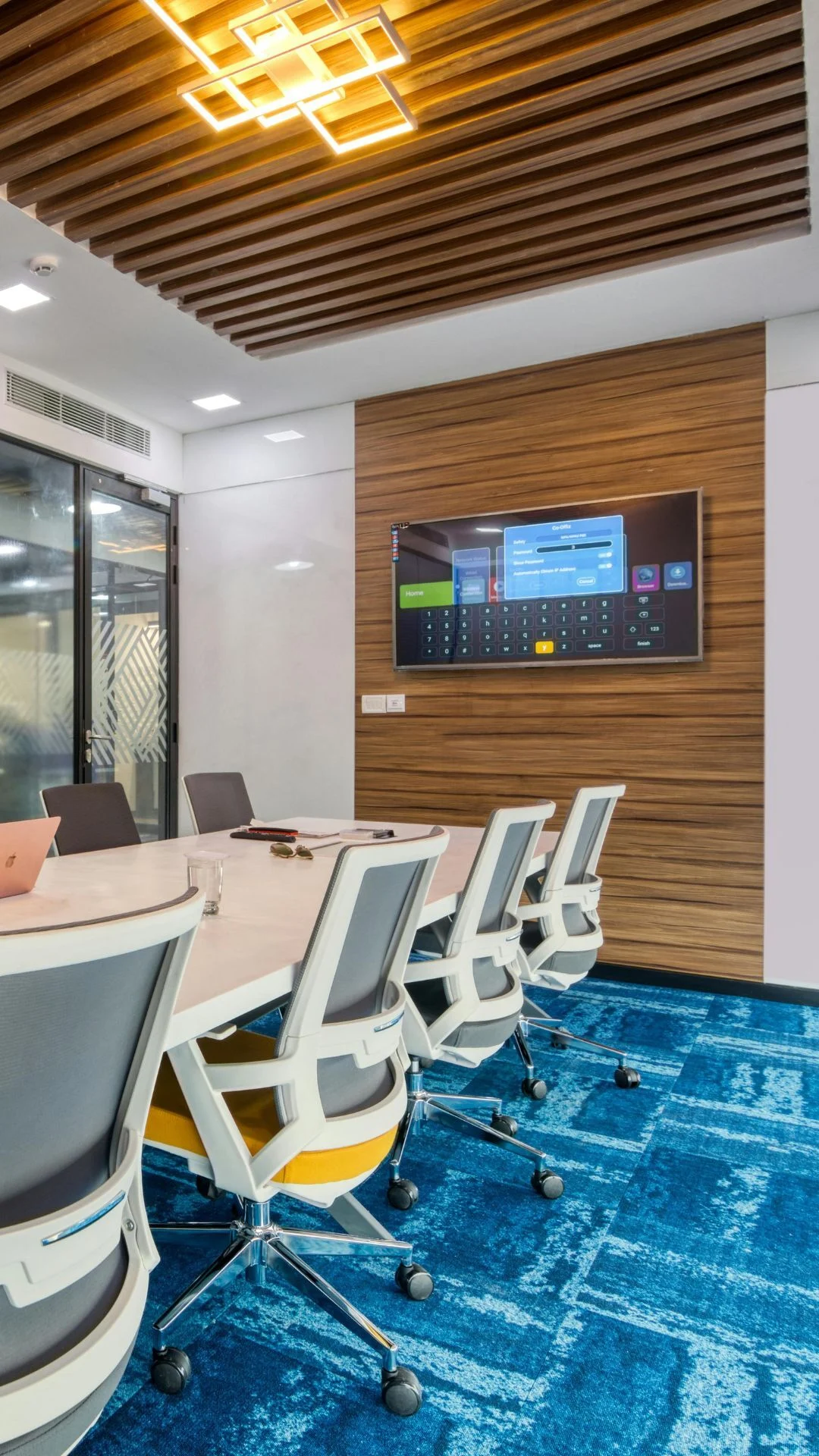 Modern commercial conference room with wood paneling