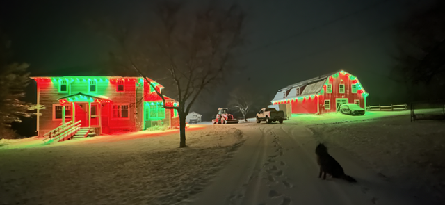 Permanent holiday lighting on a residential roofline with custom colour themes controlled via app