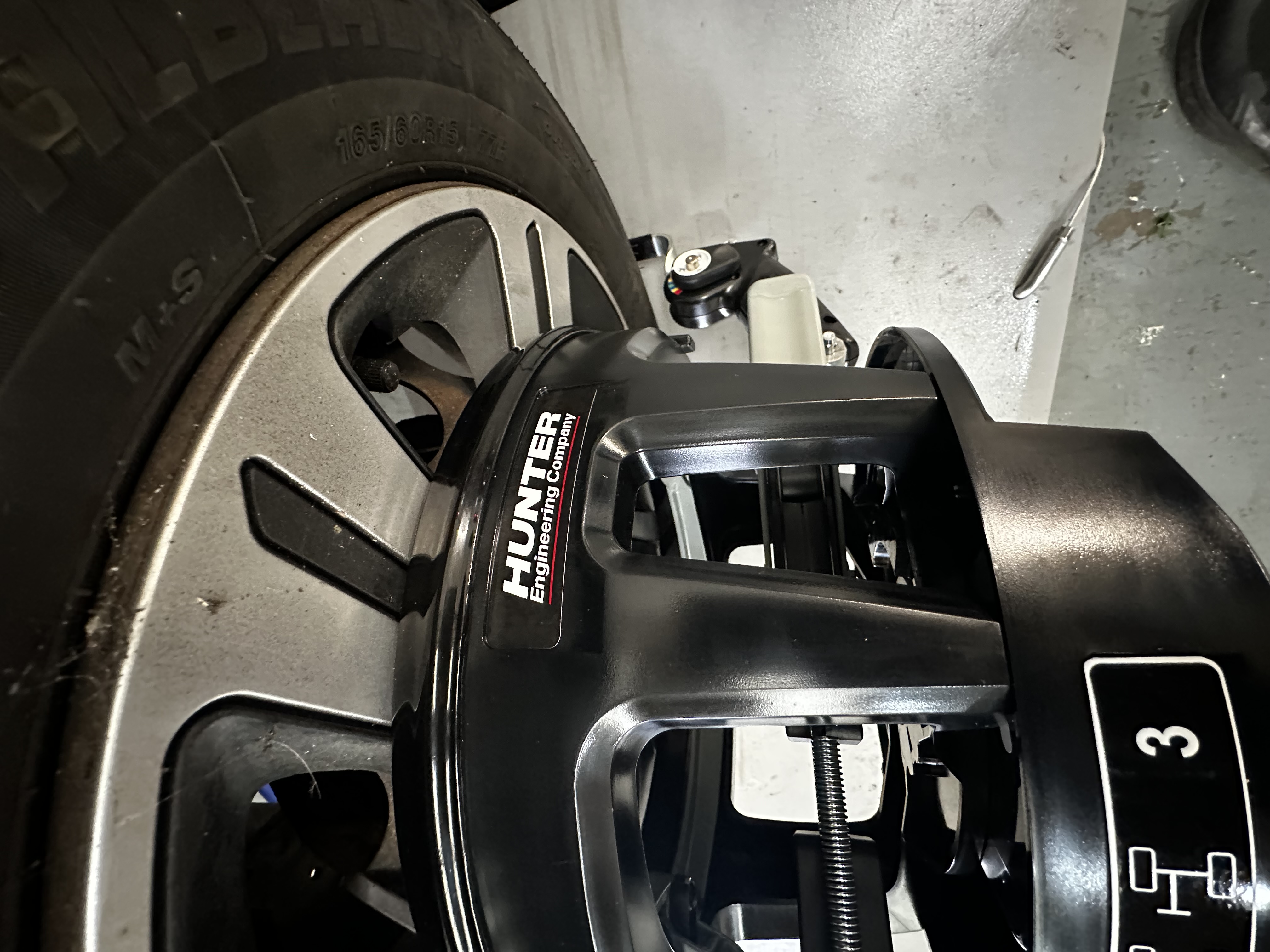 Hunter alignment target fitted to a vehicle wheel at Shaw's Service Station