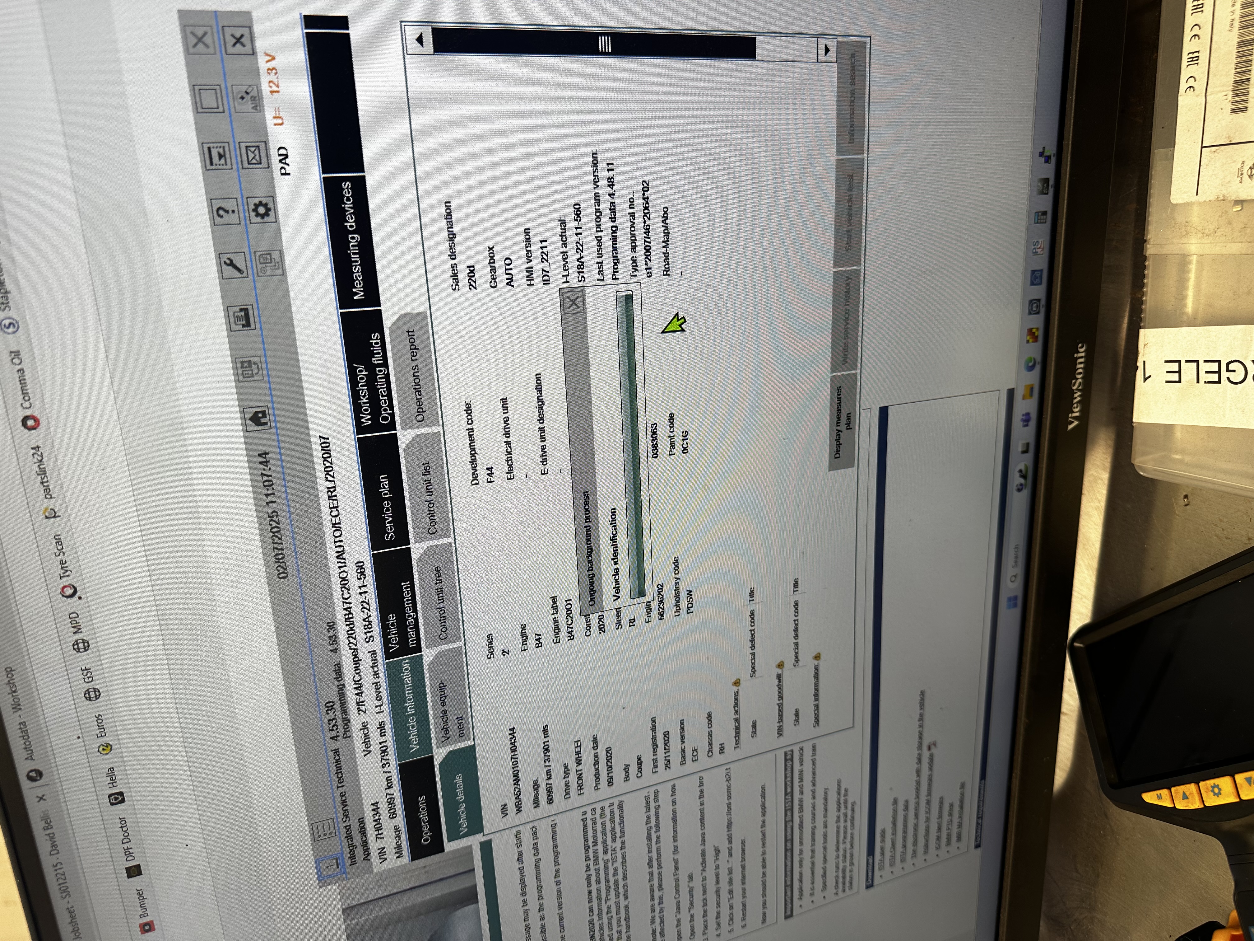 BMW digital service history displayed in the vehicle after servicing at Shaw's Service Station